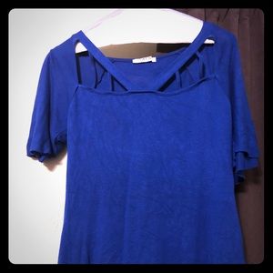 Cut out bright blue sweater.